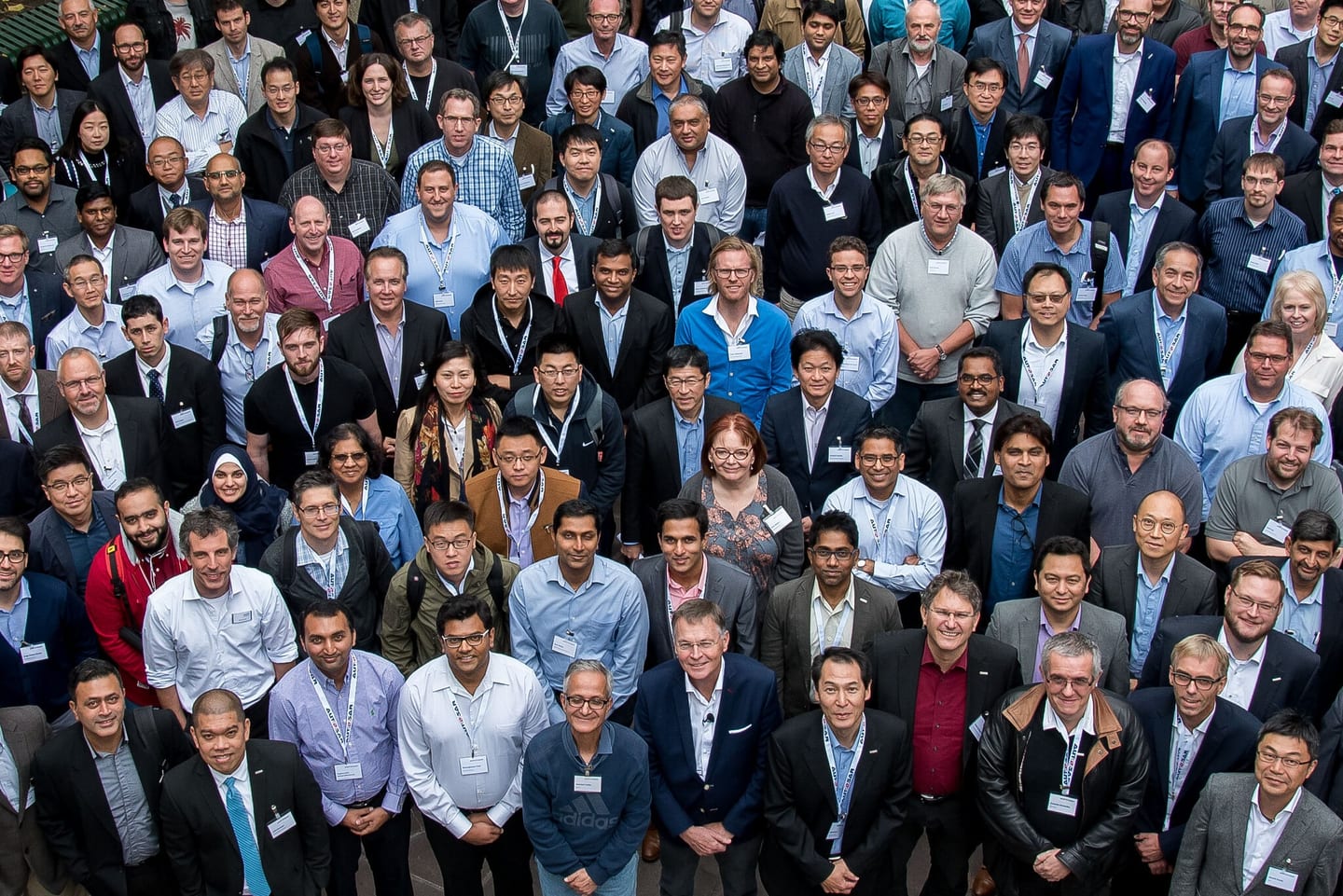A large full-company group photo at an AUTOSAR all-hands — the automotive software consortium — in the San Francisco Bay Area
