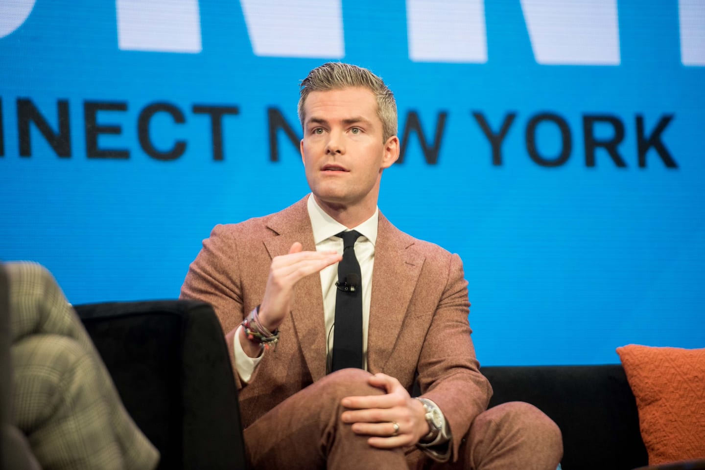 Real estate broker and TV personality Ryan Serhant speaking on a panel at Inman Connect New York